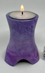 Keepsake Company's Tealight Cremation Urn in shades of lavender color .
