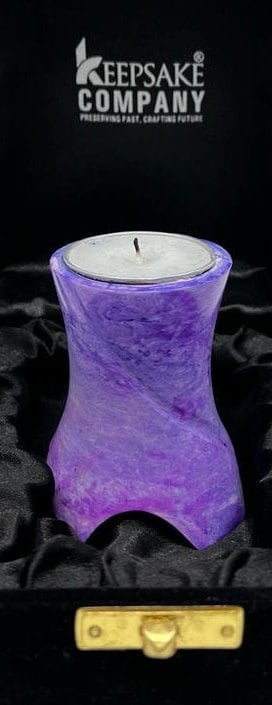 Keepsake Company's Tealight Cremation Urn in shades of lavender color .