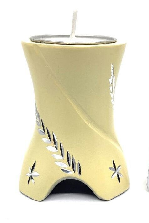 Keepsake Company's Tealight Cremation Urn in gracious pale color and sparkling engraving design