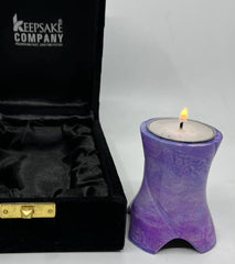 Keepsake Company's Tealight Cremation Urn in shades of lavender color .