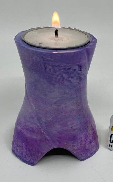 Keepsake Company's Tealight Cremation Urn in shades of lavender color .