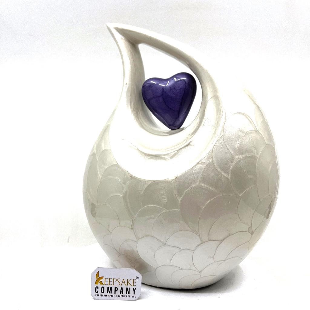 Keepsake Company's White teardrop Pearl Enamel Adult Cremation Urn with Purple Heart For Human Ashes