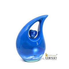 Blue Teardrop Cremation urn on a sunny bright day with  birds going home - Urn- Urns for Ashes - Memorial Urn =  Medim Urn  6 Inches Height