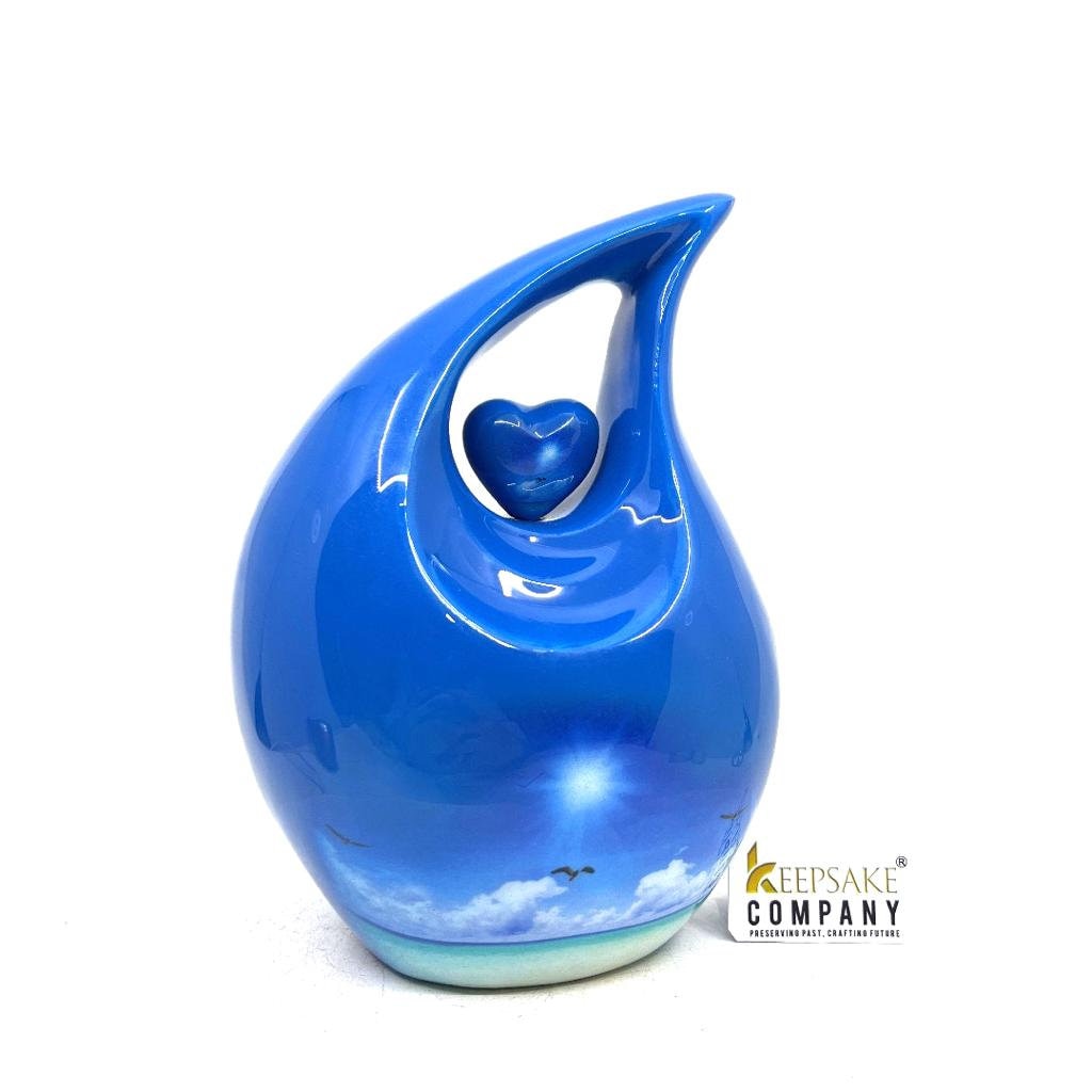 Blue Teardrop Cremation urn on a sunny bright day with  birds going home - Urn- Urns for Ashes - Medim Urn / Ash Urn  (7 Inches  Height)