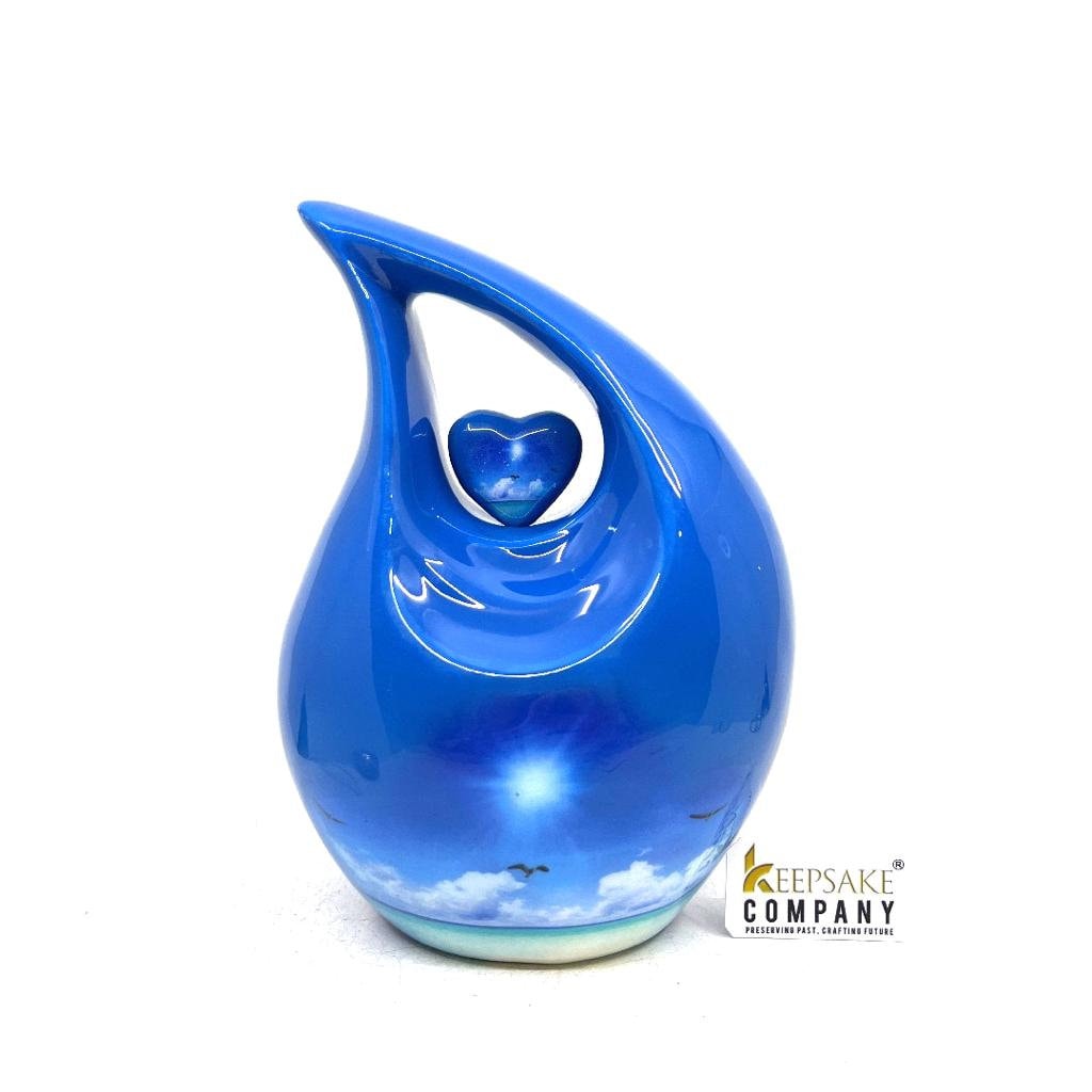 Blue Teardrop Cremation urn on a sunny bright day with  birds going home - Urn- Urns for Ashes - Medim Urn / Ash Urn  (7 Inches  Height)