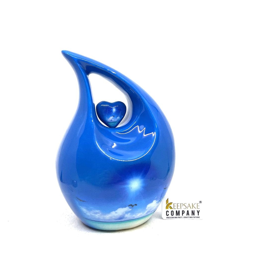 Blue Teardrop Cremation urn on a sunny bright day with  birds going home - Urn- Urns for Ashes - Medim Urn / Ash Urn  (7 Inches  Height)